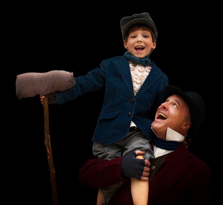 Photo of two actors dressed up as characters from A Christmas Carol by Charles Dickens